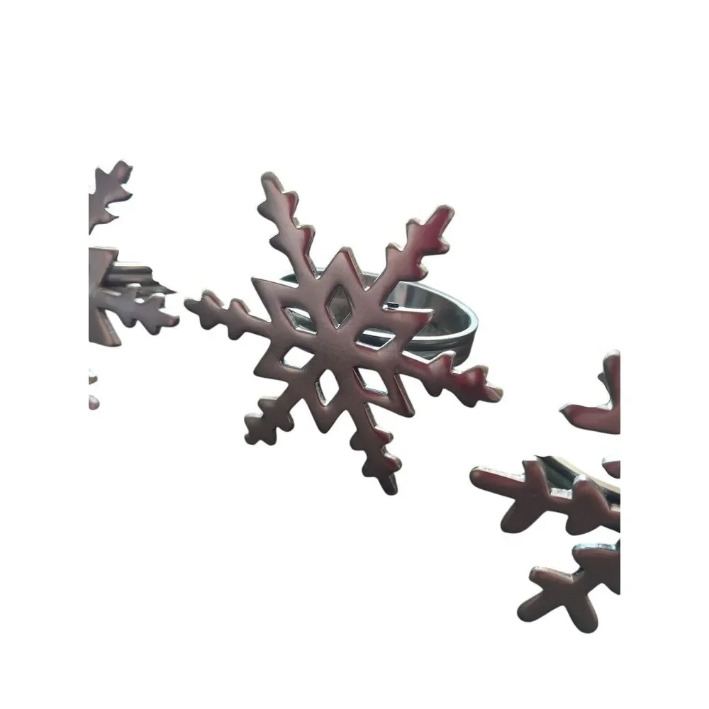 VINTAGE Lot of FOUR Silver Tone Snowflake Napkin Rings Christmas Holidays